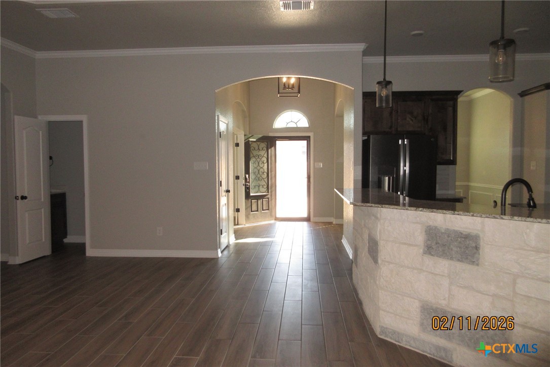 7623 Palladium Loop Killeen, TX 76542 - Photo 40 of 40 a view of a room with wooden floor and a ceiling fan