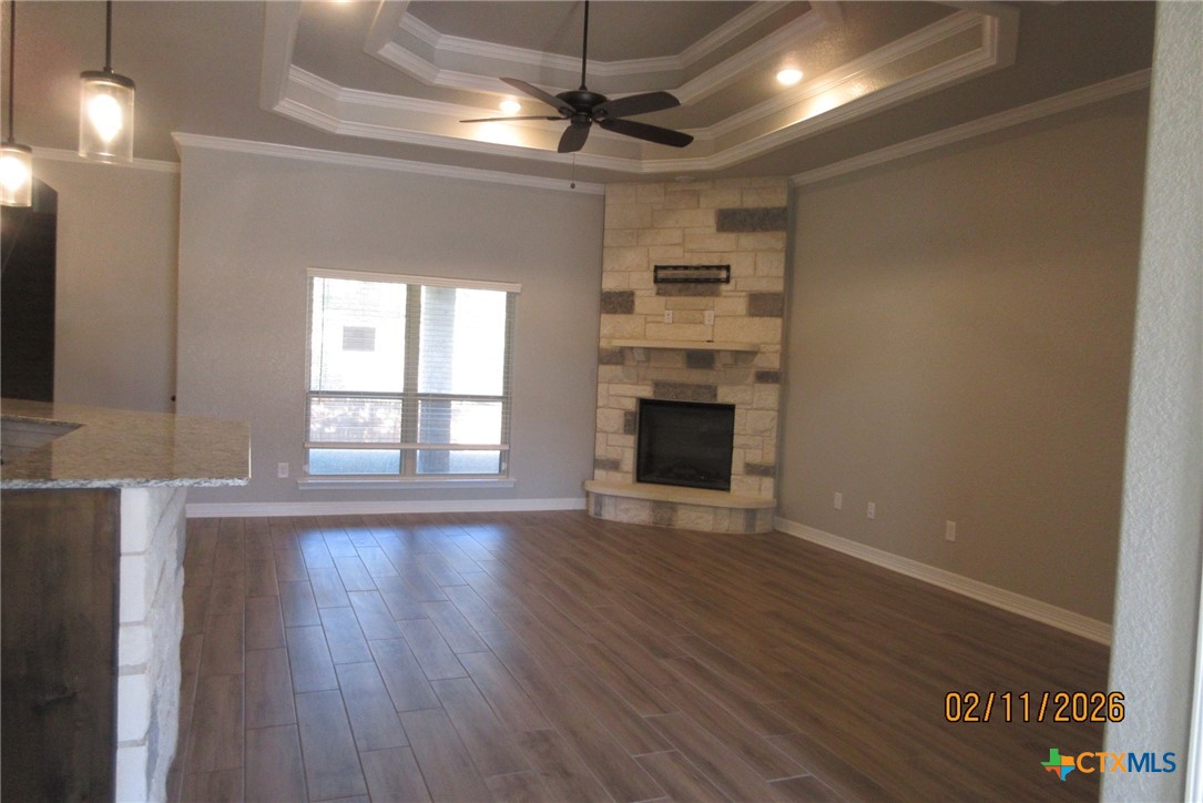 7623 Palladium Loop Killeen, TX 76542 - Photo 9 of 40 a view of a kitchen with a sink wooden floor and a window