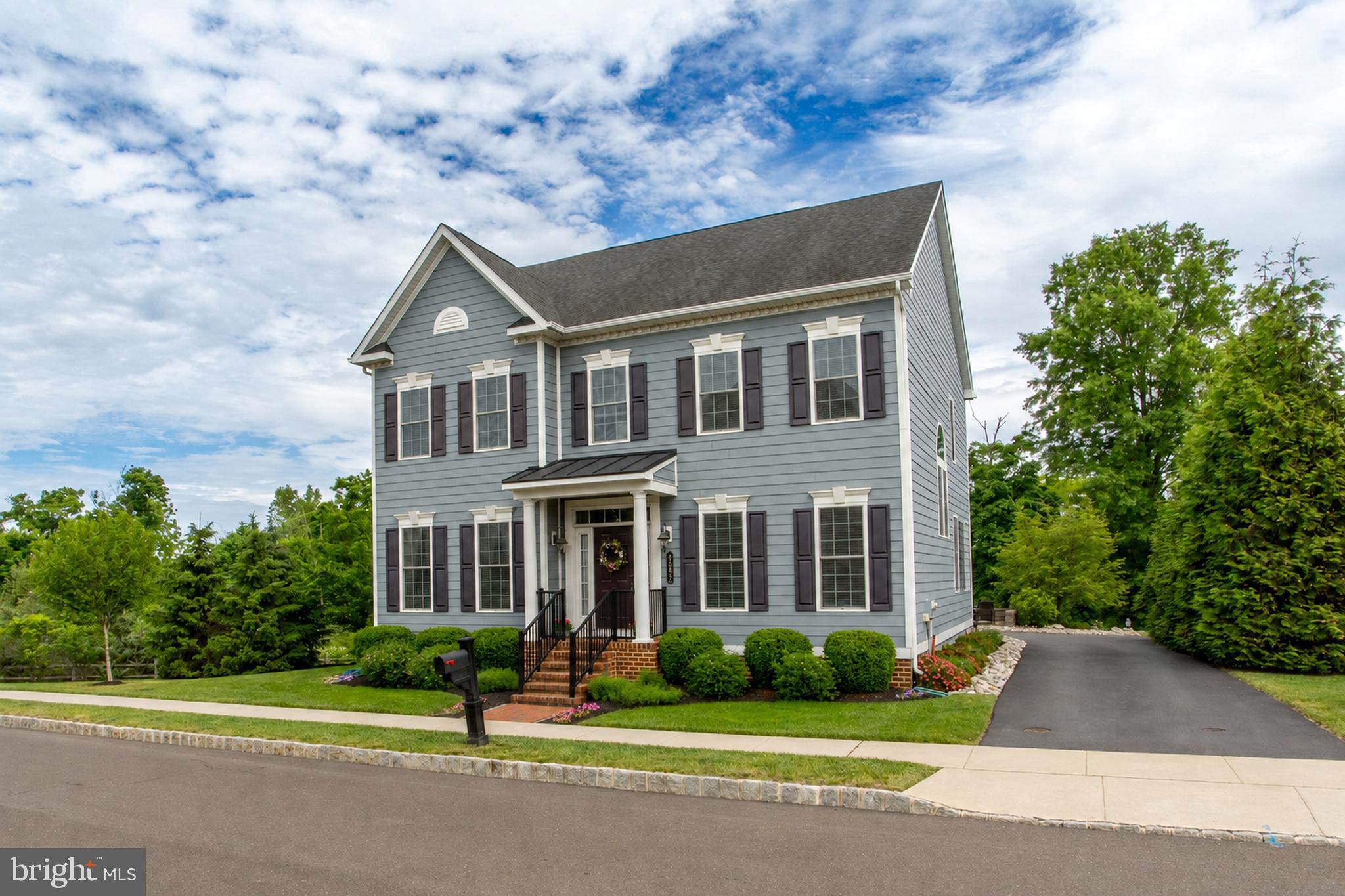 4682 Plough Tavern Road Doylestown, PA 18902 - Photo 2 of 42 a front view of a house with a yard