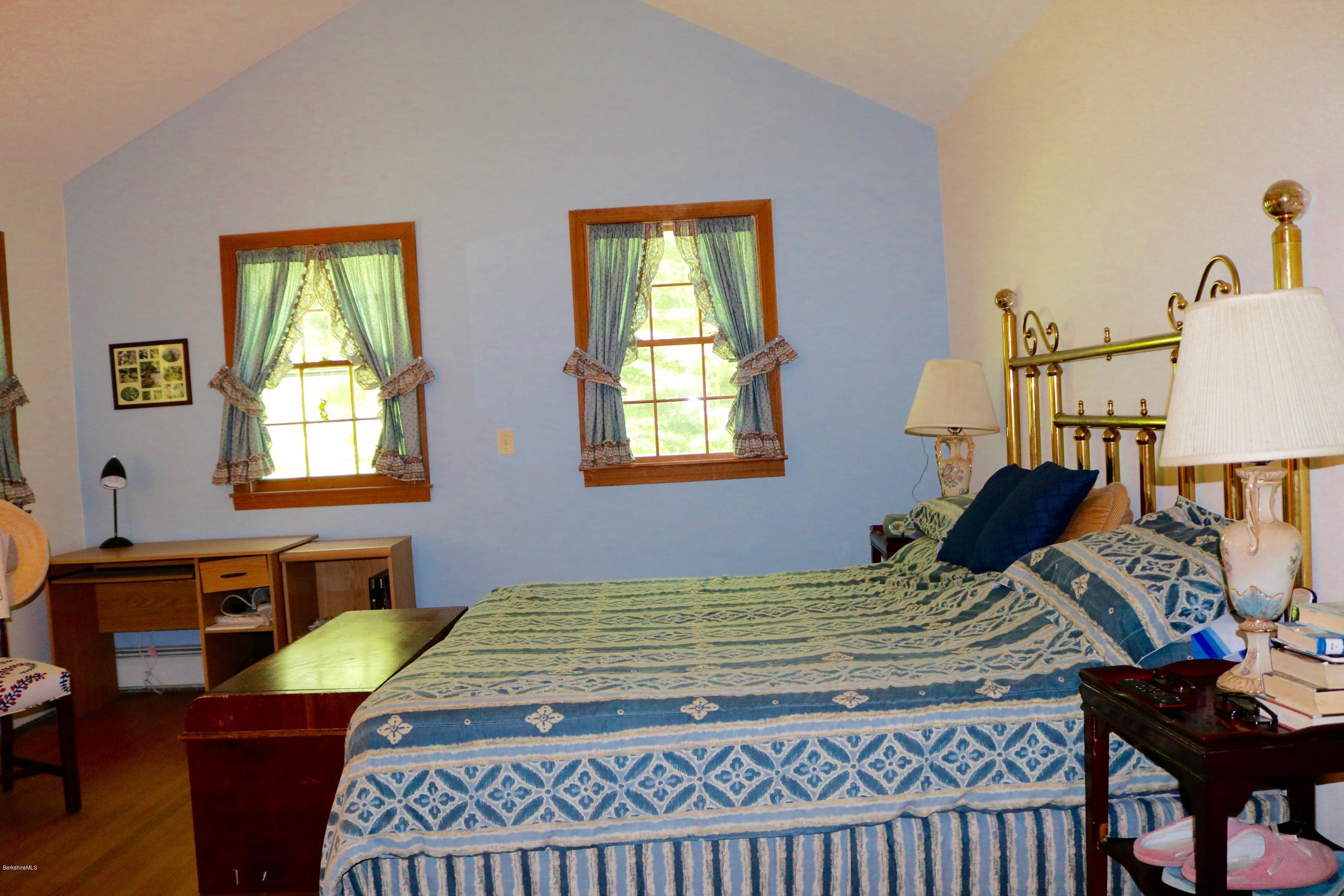 2401 West Center Road Otis, MA 01253 - Photo 11 of 24 a bedroom with furniture and window