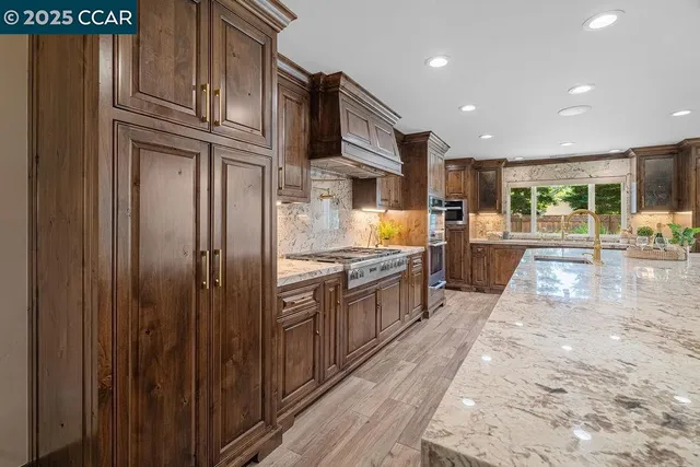 a bedroom with a large bed and a tv