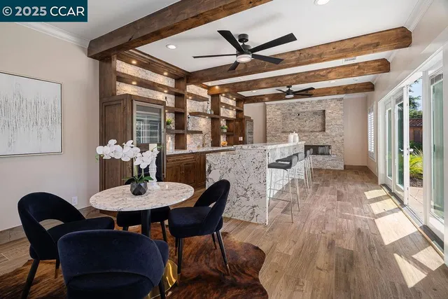 a living room with furniture and a rug