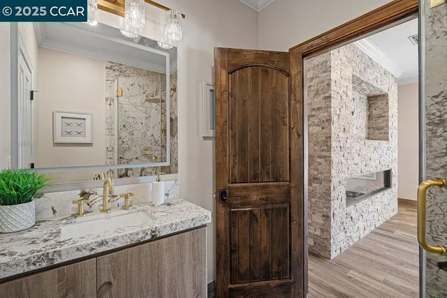 a large bathroom with a double vanity sink and a mirror