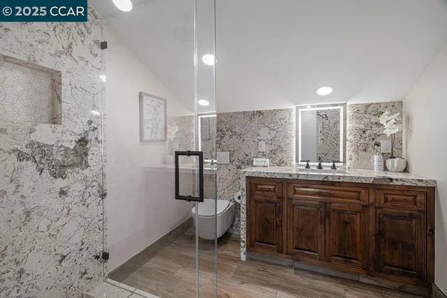 an aerial view of a house with yard swimming pool and outdoor seating