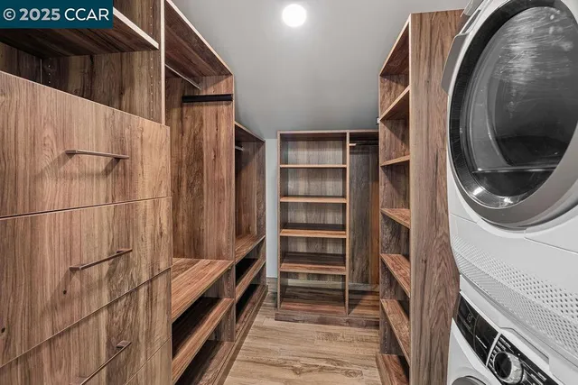 an aerial view of a house with a yard and garden