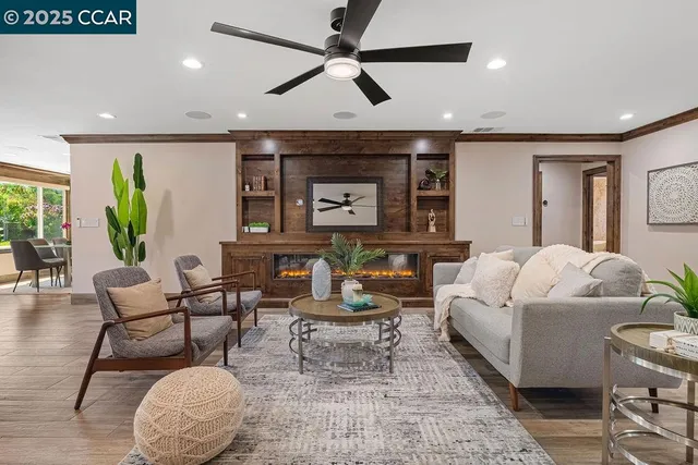 a room with furniture and a potted plant