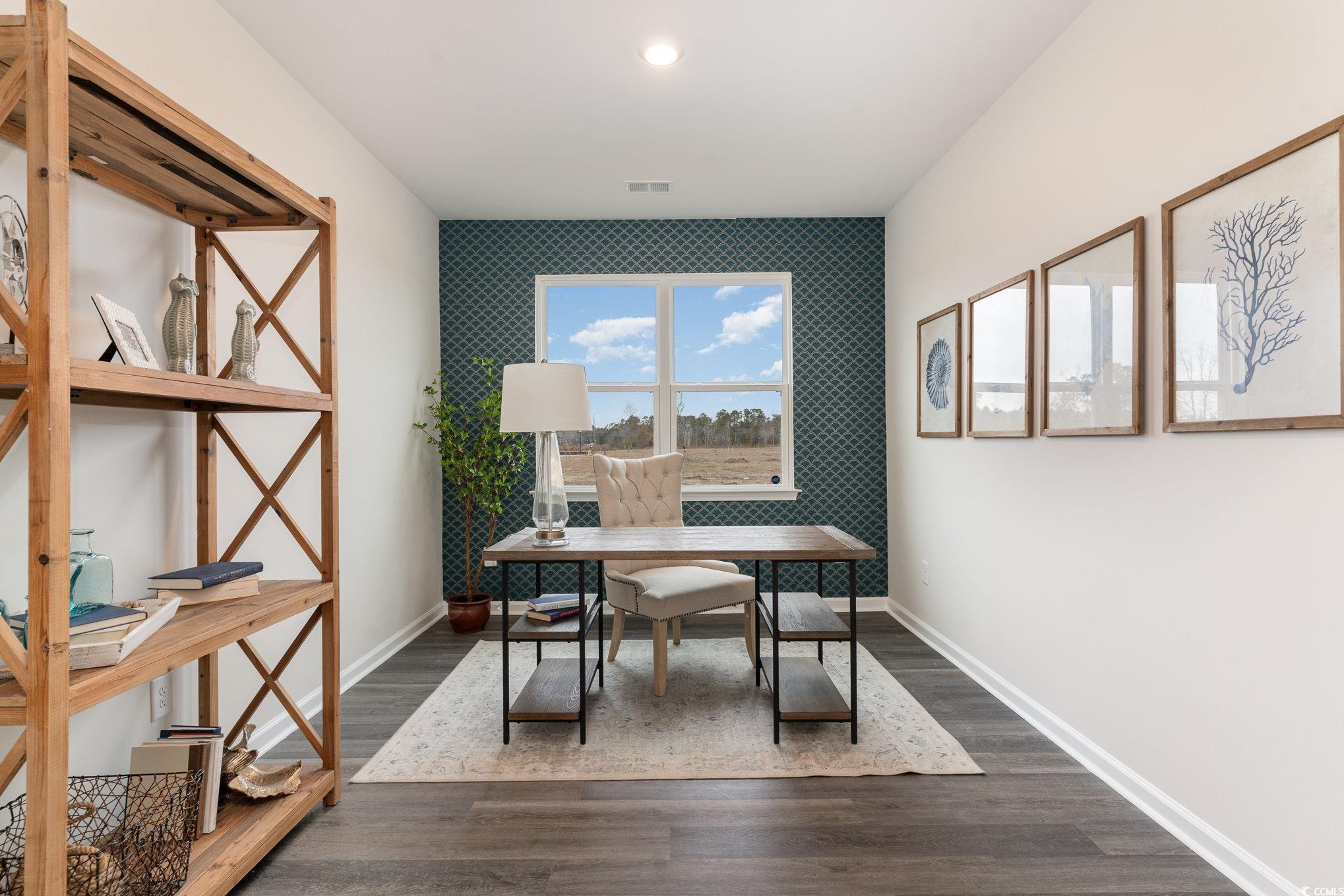 7367 Meadow Walk Loop Loris, SC 29569 - Photo 19 of 25 Office space featuring baseboards, dark wood-style flooring, an accent wall, and visible vents