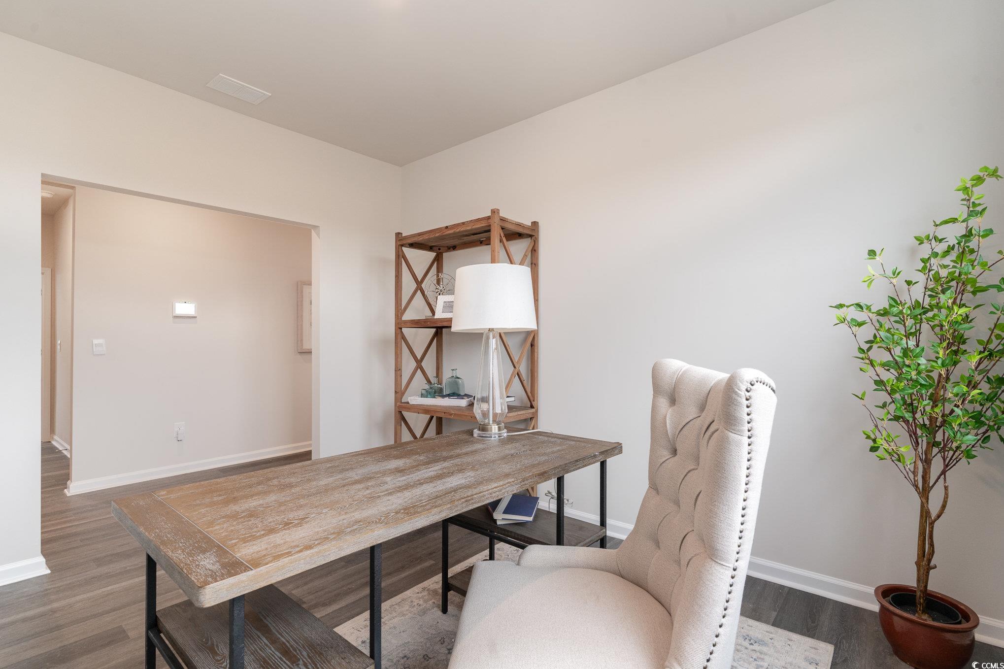 7367 Meadow Walk Loop Loris, SC 29569 - Photo 20 of 25 Office area with baseboards and wood finished floors