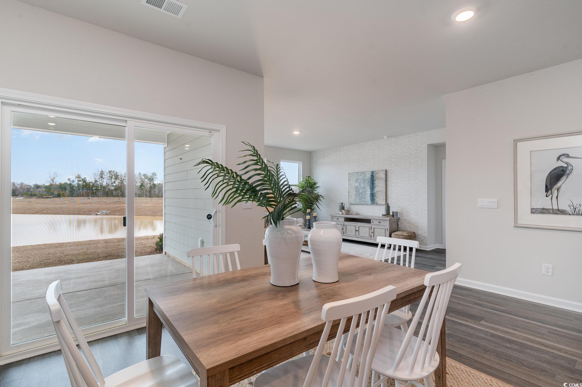 7367 Meadow Walk Loop Loris, SC 29569 - Photo 6 of 25 Dining room with recessed lighting, baseboards, dark wood finished floors, and visible vents