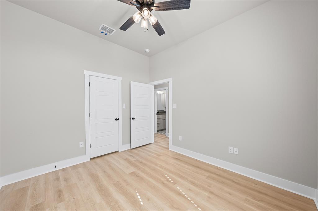 825 Forward Pass Drive Hewitt, TX 76643 - Photo 11 of 37 wooden floor in an empty room