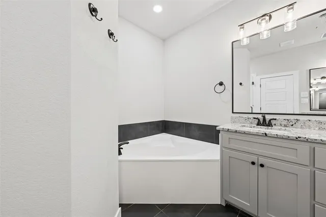 a utility room with a sink dryer and washer
