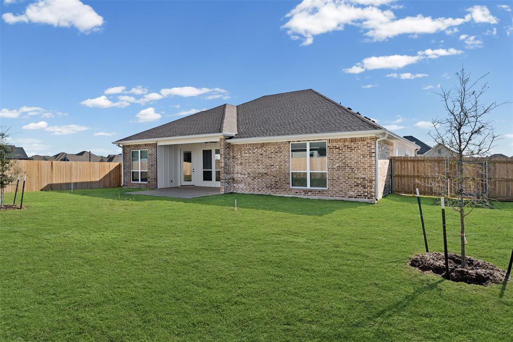 825 Forward Pass Drive Hewitt, TX 76643 - Photo 36 of 37 a view of a house with a backyard