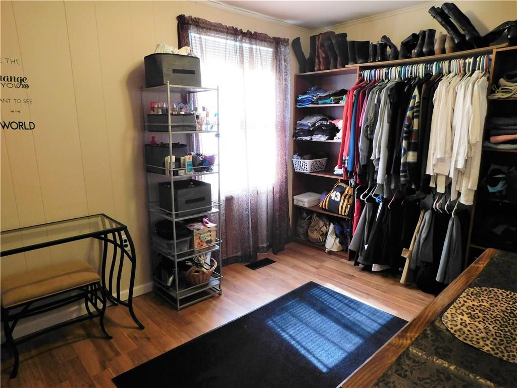 253 Garner Road Edinburg, PA 16116 - Photo 22 of 25 3rd bedroom currently a dressing room. Removable shelving for easily re-converting to bedroom