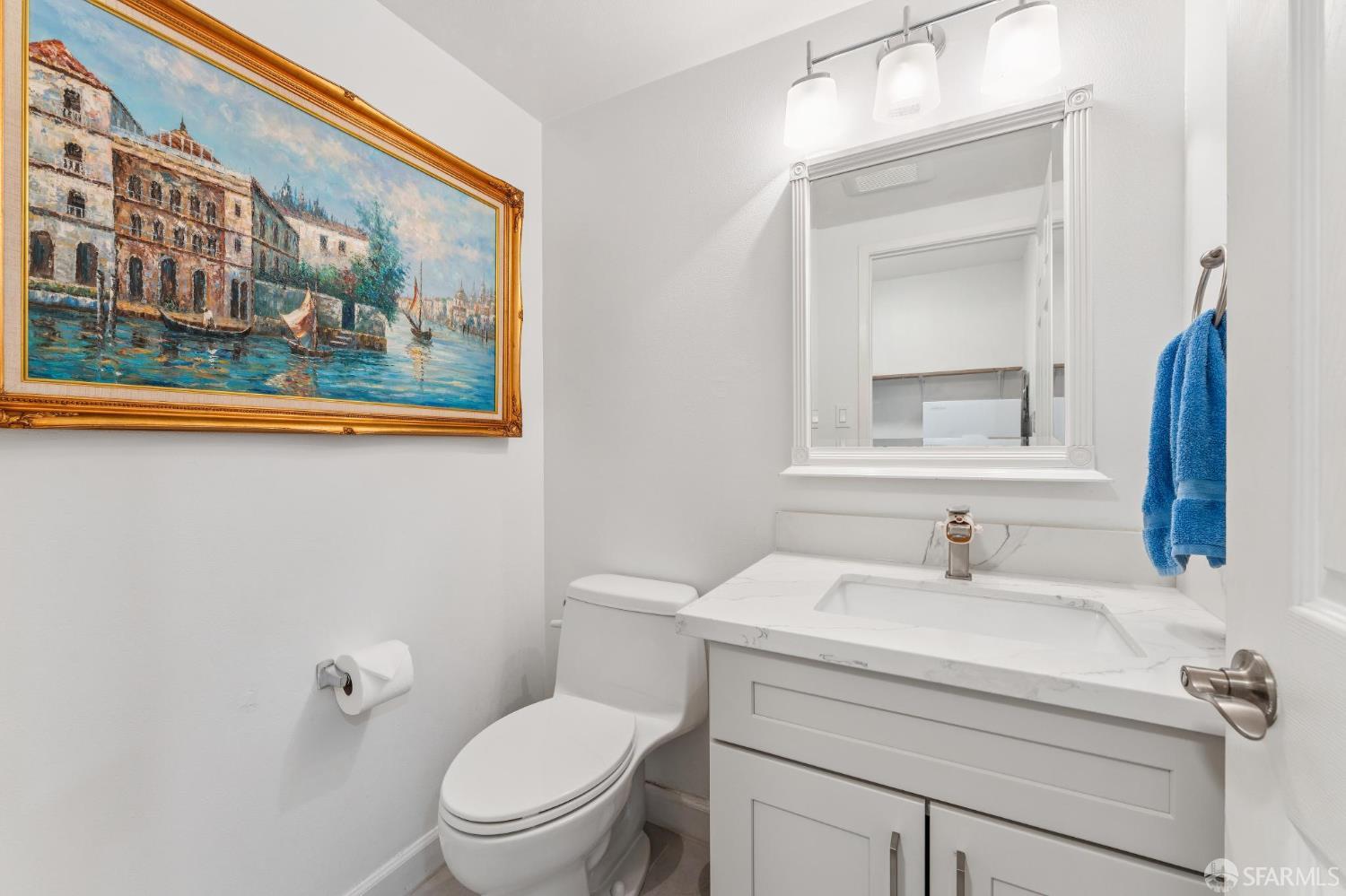 27788 Hummingbird Court Hayward, CA 94545 - Photo 11 of 36 a bathroom with a toilet sink and mirror