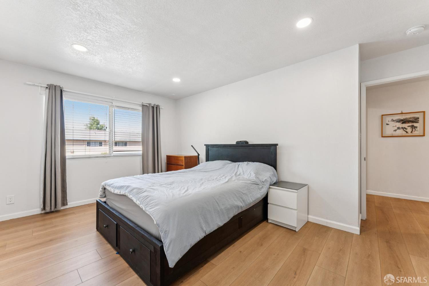 27788 Hummingbird Court Hayward, CA 94545 - Photo 13 of 36 a bedroom with a bed and a table