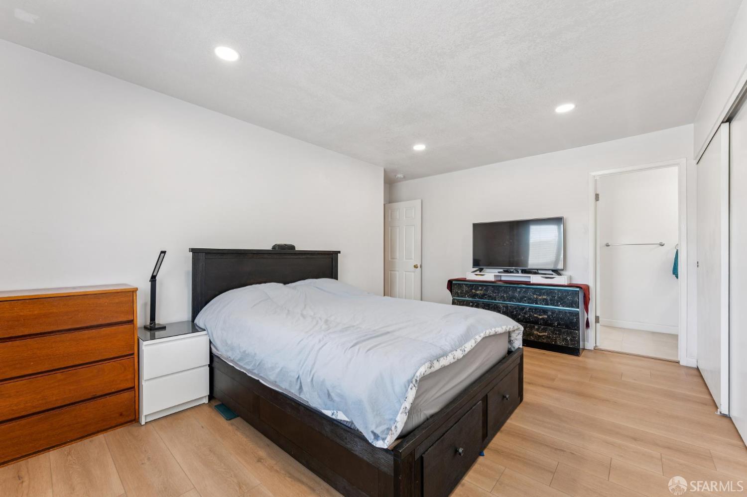 27788 Hummingbird Court Hayward, CA 94545 - Photo 14 of 36 a bedroom with a bed and a television