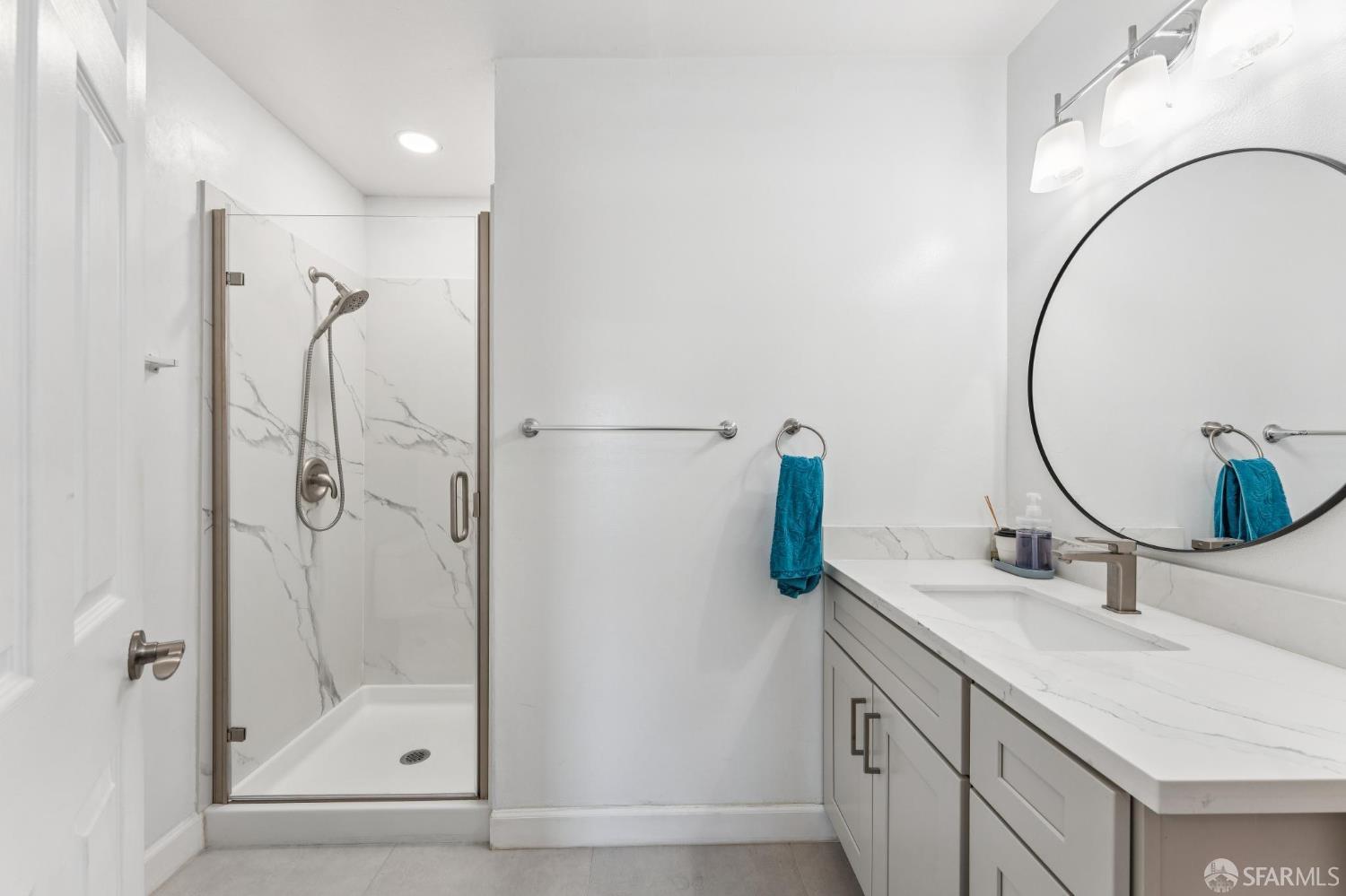 27788 Hummingbird Court Hayward, CA 94545 - Photo 16 of 36 a bathroom with a sink and a mirror