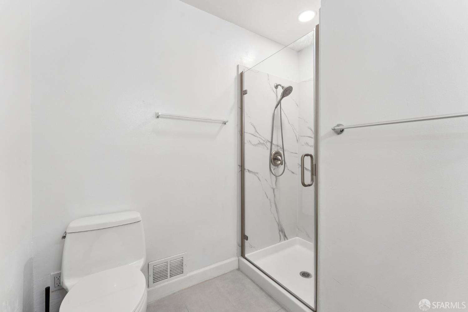 27788 Hummingbird Court Hayward, CA 94545 - Photo 17 of 36 a bathroom with a shower and toilet
