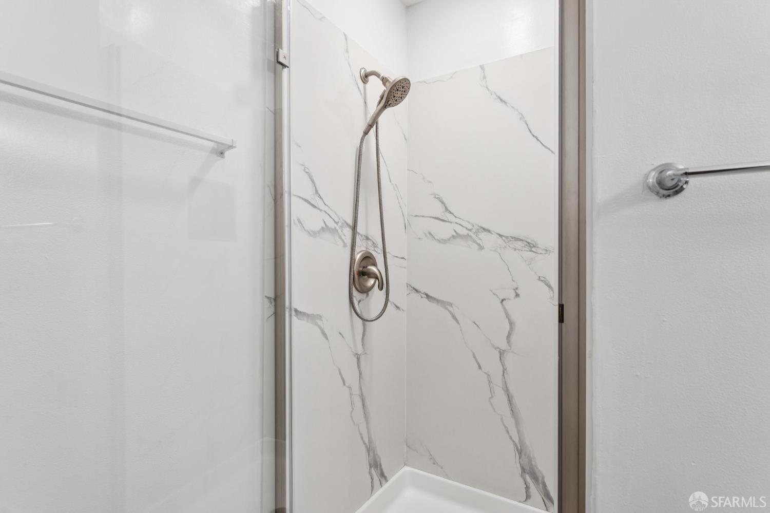 27788 Hummingbird Court Hayward, CA 94545 - Photo 18 of 36 a bathroom with a glass shower door