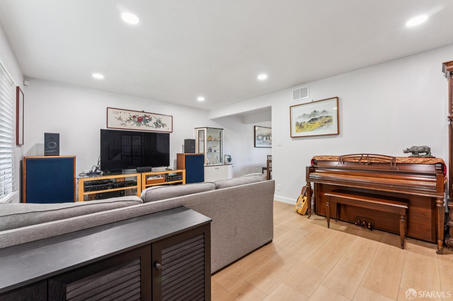 27788 Hummingbird Court Hayward, CA 94545 - Photo 2 of 36 a living room with furniture and a flat screen tv