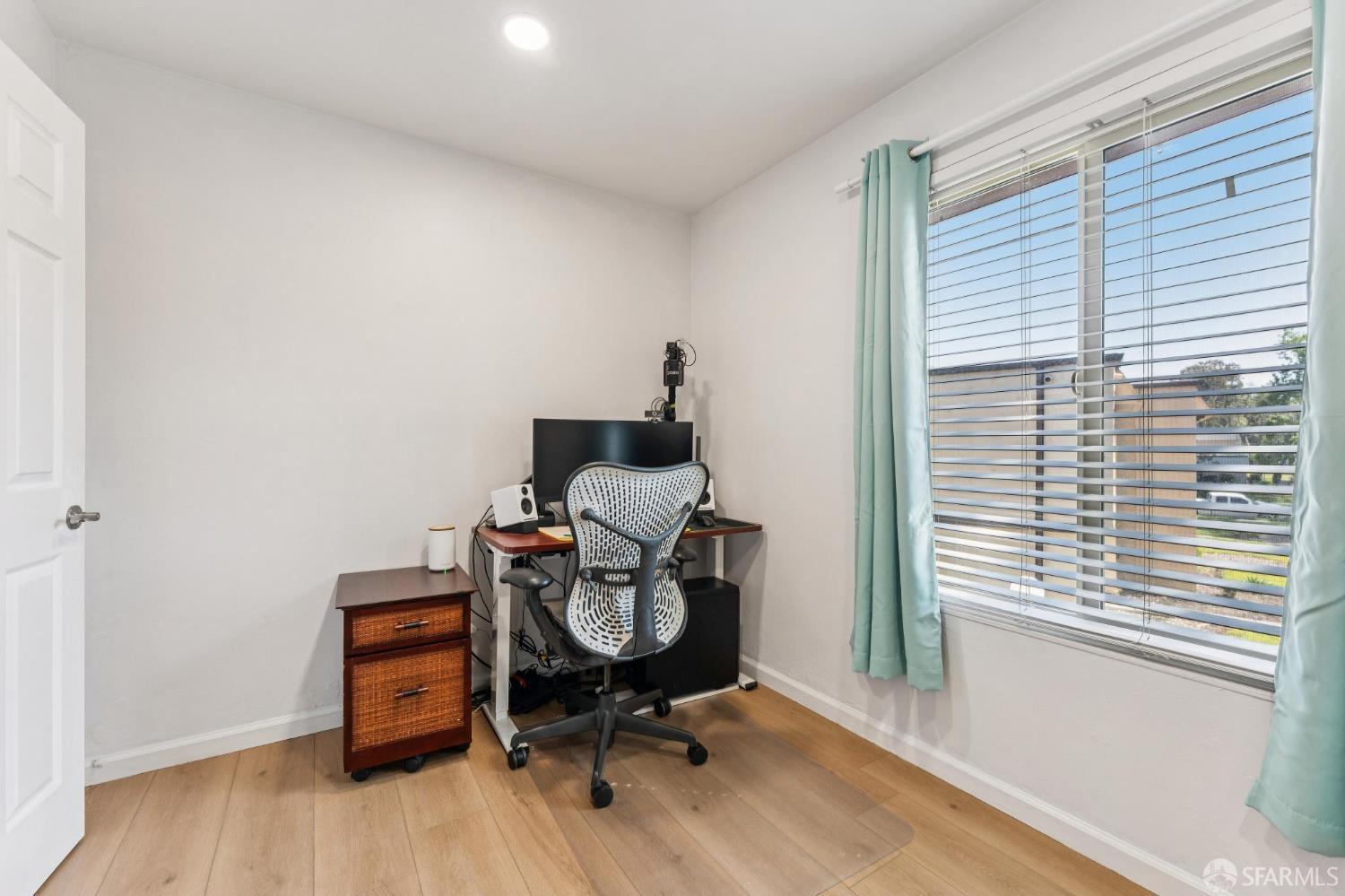27788 Hummingbird Court Hayward, CA 94545 - Photo 23 of 36 a view of a workspace with furniture and a window