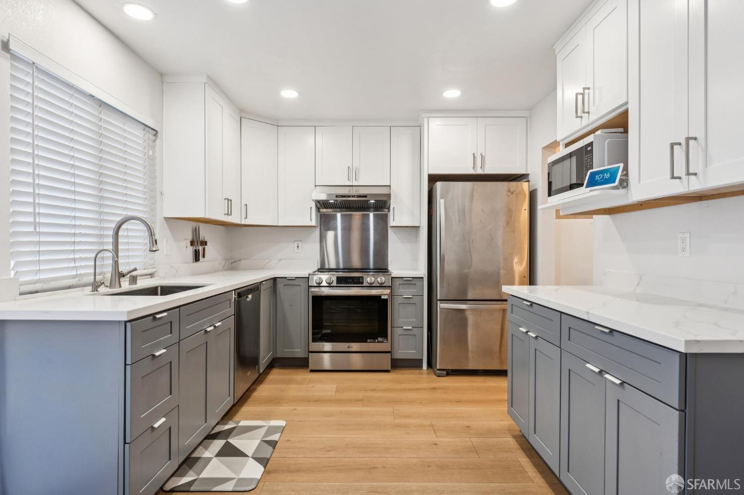 27788 Hummingbird Court Hayward, CA 94545 - Photo 7 of 36 a kitchen with stainless steel appliances granite countertop a refrigerator stove and sink
