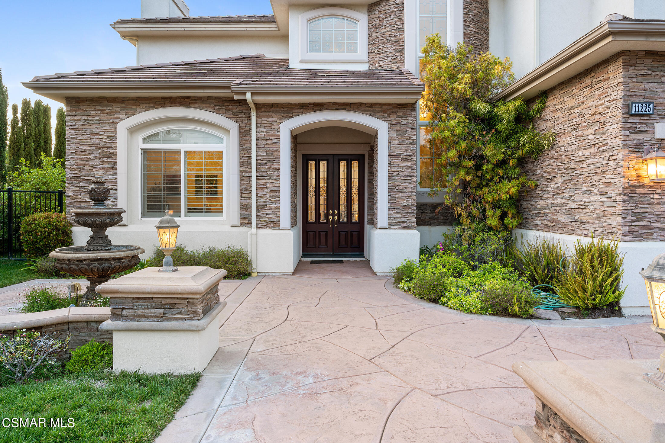 11225 Watson Drive Moorpark, CA 93021 - Photo 14 of 89 a front view of a house with garden