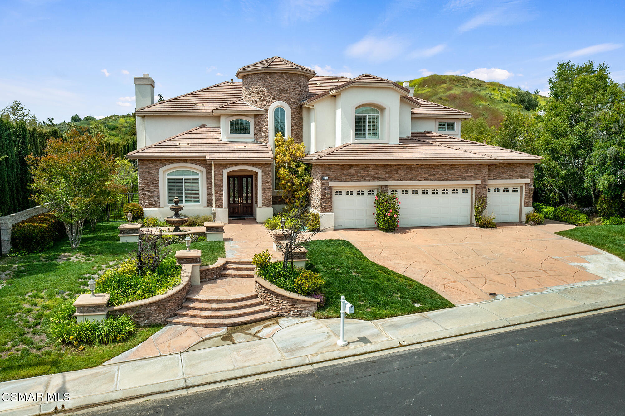 11225 Watson Drive Moorpark, CA 93021 - Photo 3 of 89 a front view of a house with a yard