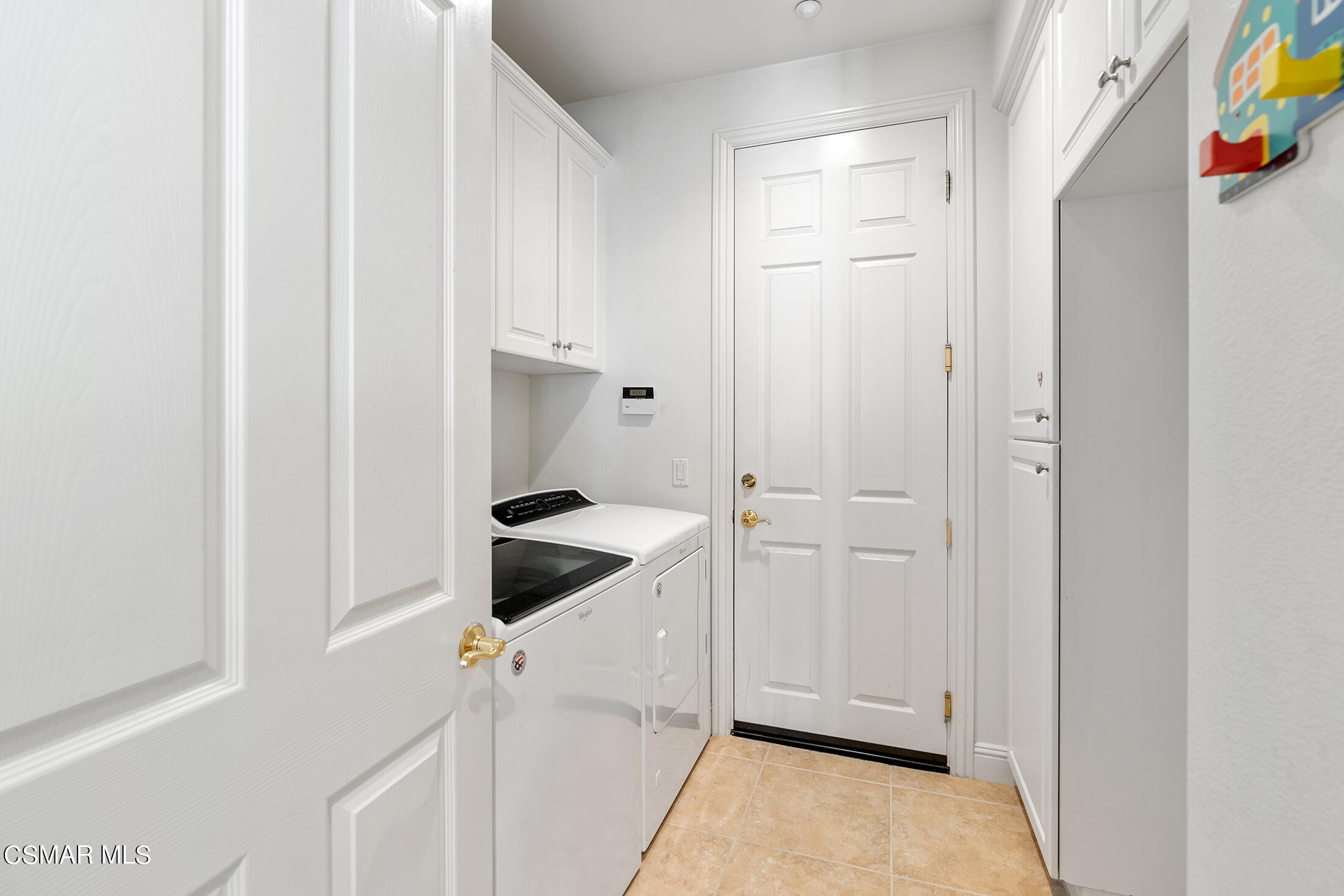 11225 Watson Drive Moorpark, CA 93021 - Photo 35 of 89 a bathroom with a granite countertop sink and washing machine