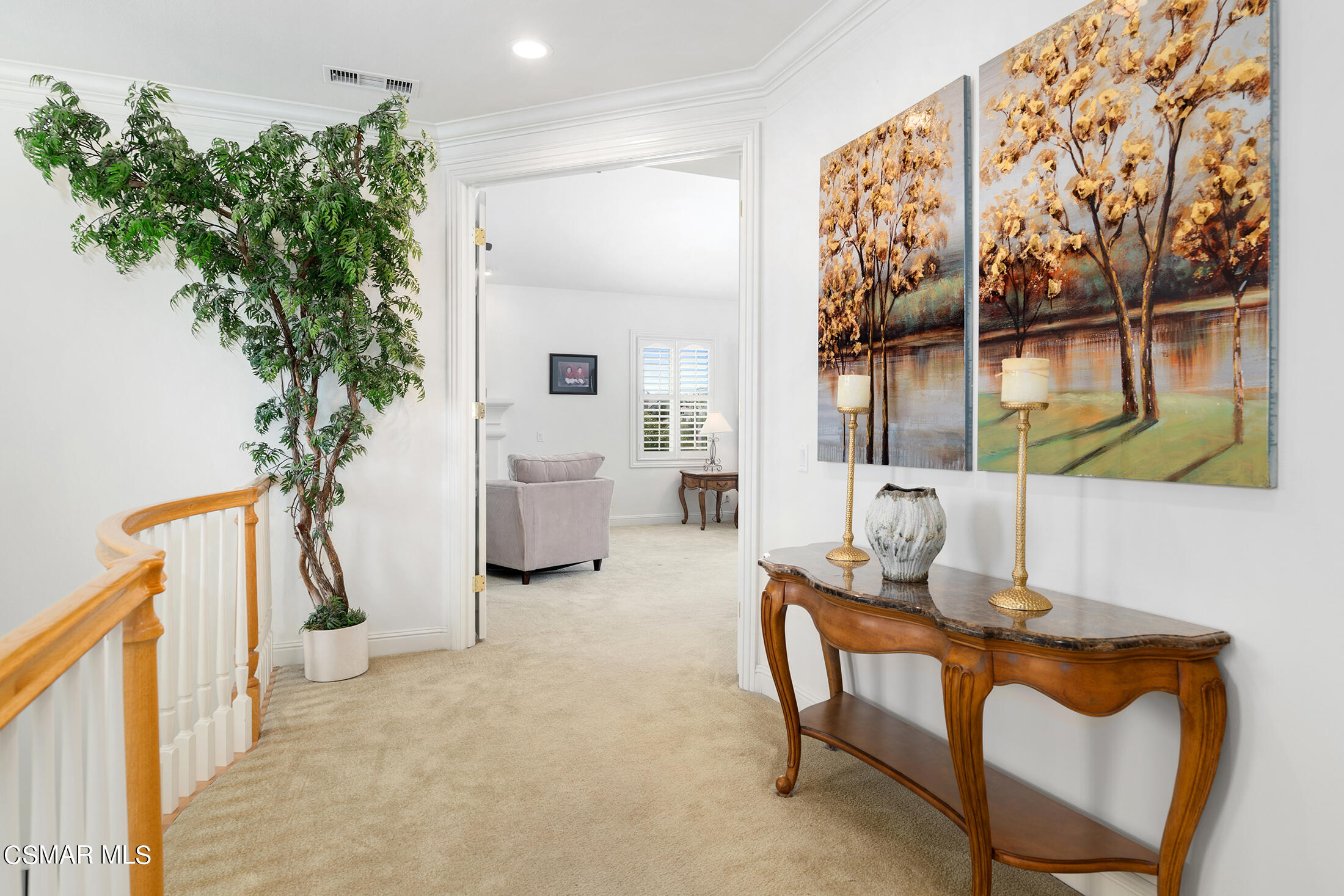 11225 Watson Drive Moorpark, CA 93021 - Photo 49 of 89 a living room with furniture a lamp and a potted plant
