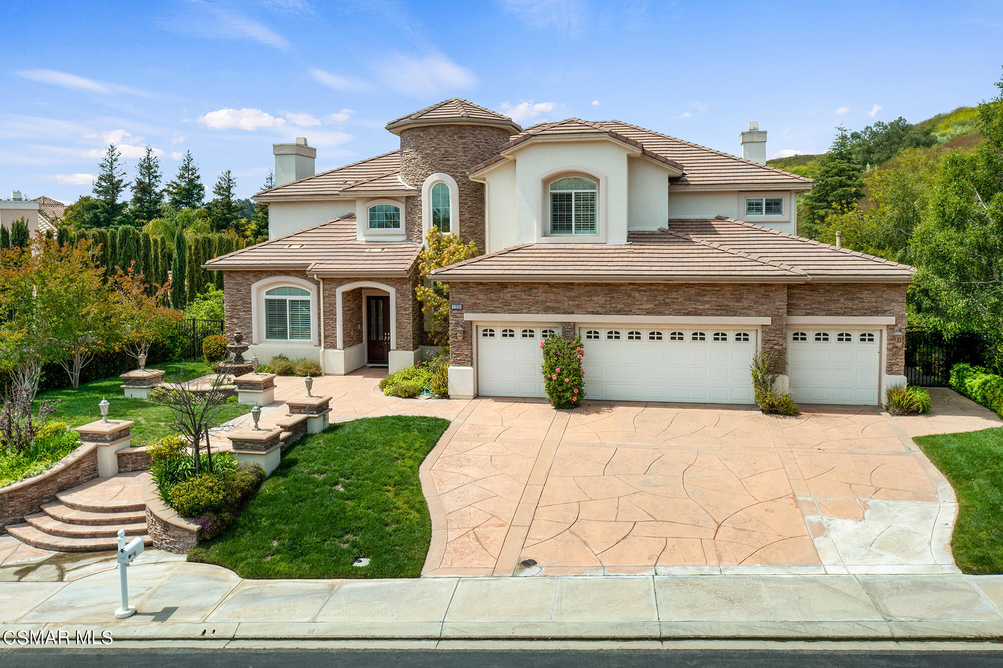 11225 Watson Drive Moorpark, CA 93021 - Photo 6 of 89 a front view of a house with entertaining space