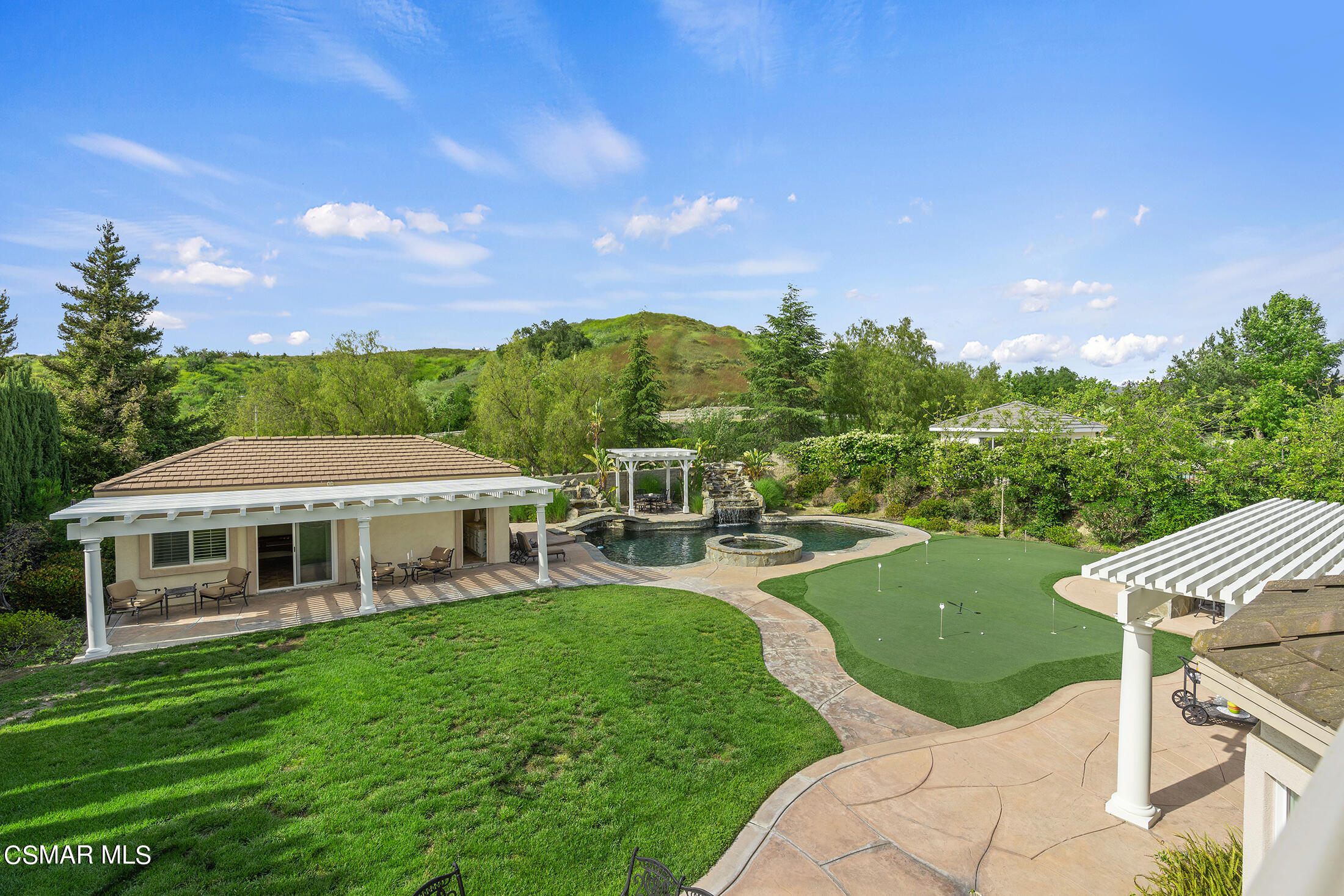 11225 Watson Drive Moorpark, CA 93021 - Photo 62 of 89 a view of a house with a yard