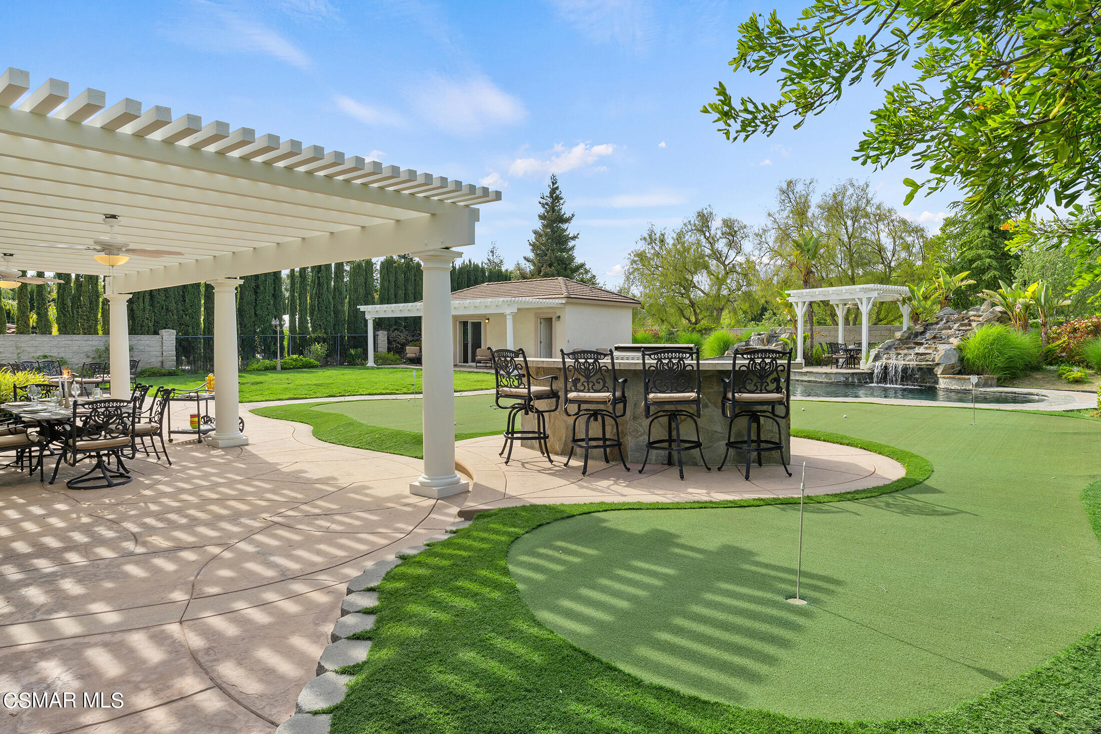 11225 Watson Drive Moorpark, CA 93021 - Photo 65 of 89 a view of a house with backyard porch and sitting area