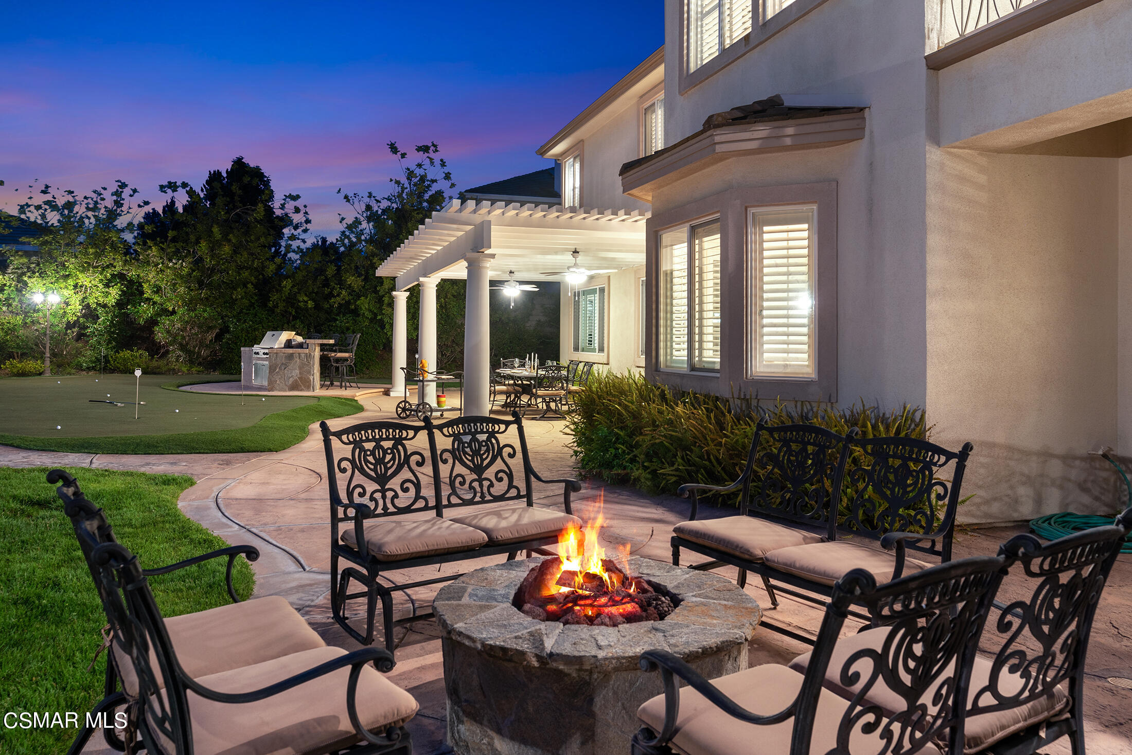 11225 Watson Drive Moorpark, CA 93021 - Photo 80 of 89 a view of a patio with couches table and chairs with garden view