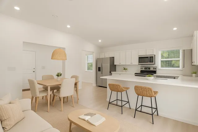 a view of a dining room with furniture