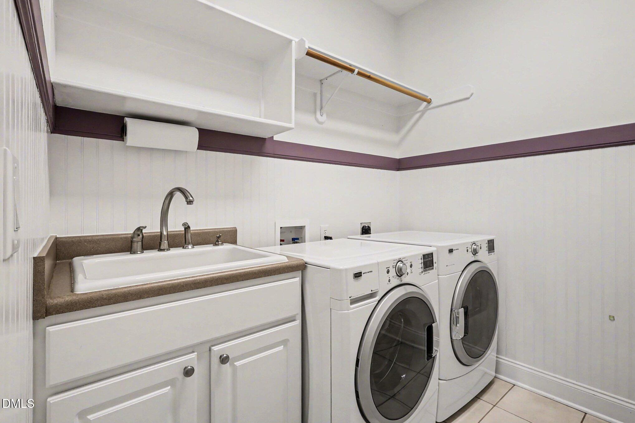 1108 Neuse Ridge Drive Clayton, NC 27527 - Photo 21 of 52 a utility room with dryer and washer