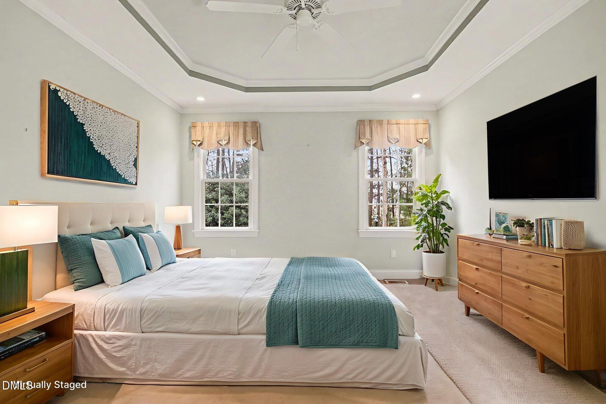 1108 Neuse Ridge Drive Clayton, NC 27527 - Photo 24 of 52 a bedroom with a bed and a flat screen tv