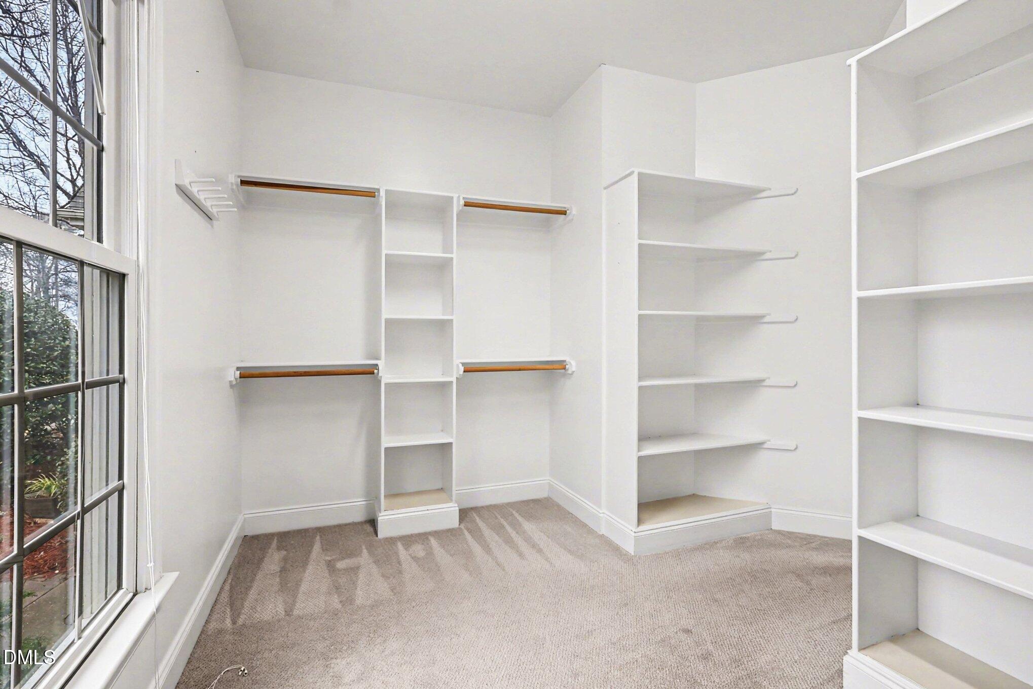 1108 Neuse Ridge Drive Clayton, NC 27527 - Photo 34 of 52 a view of an empty walk in closet