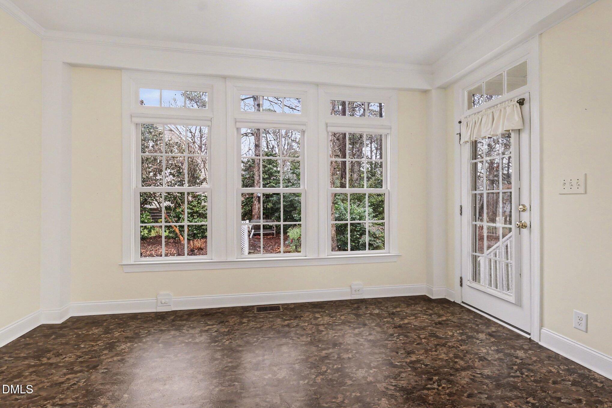 1108 Neuse Ridge Drive Clayton, NC 27527 - Photo 40 of 52 a view of an empty room with a window