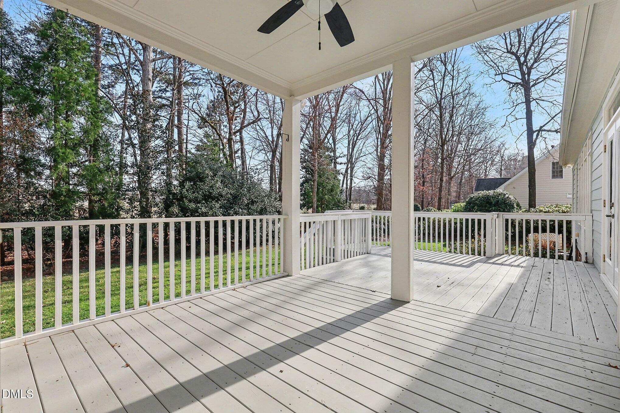 1108 Neuse Ridge Drive Clayton, NC 27527 - Photo 43 of 52 a balcony with wooden floor and fence