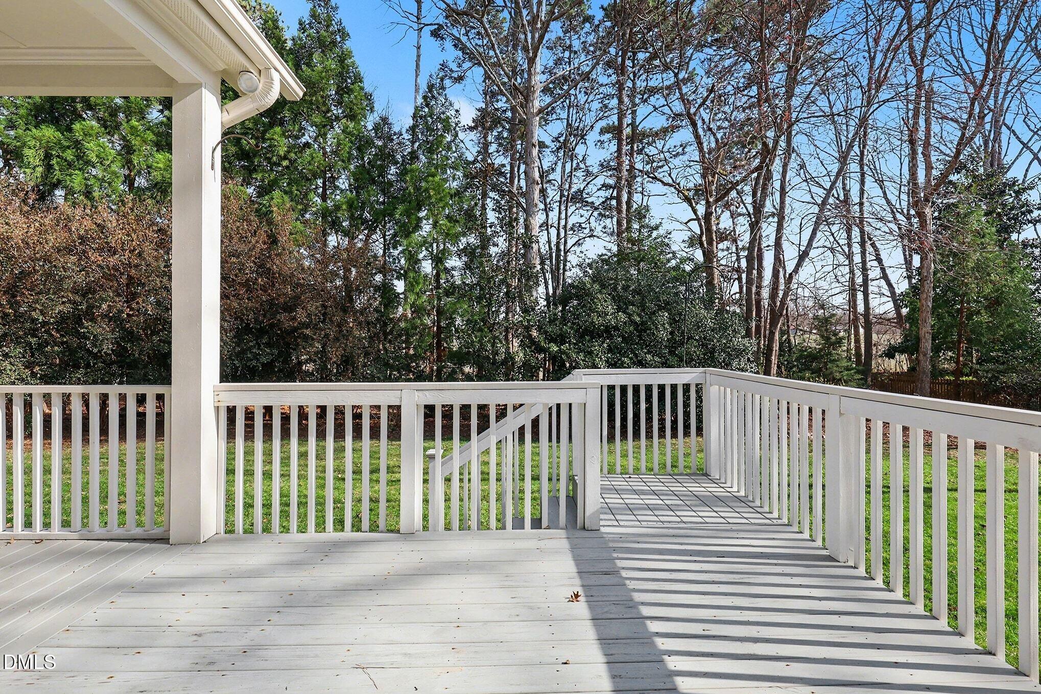 1108 Neuse Ridge Drive Clayton, NC 27527 - Photo 44 of 52 a balcony with wooden floor and fence