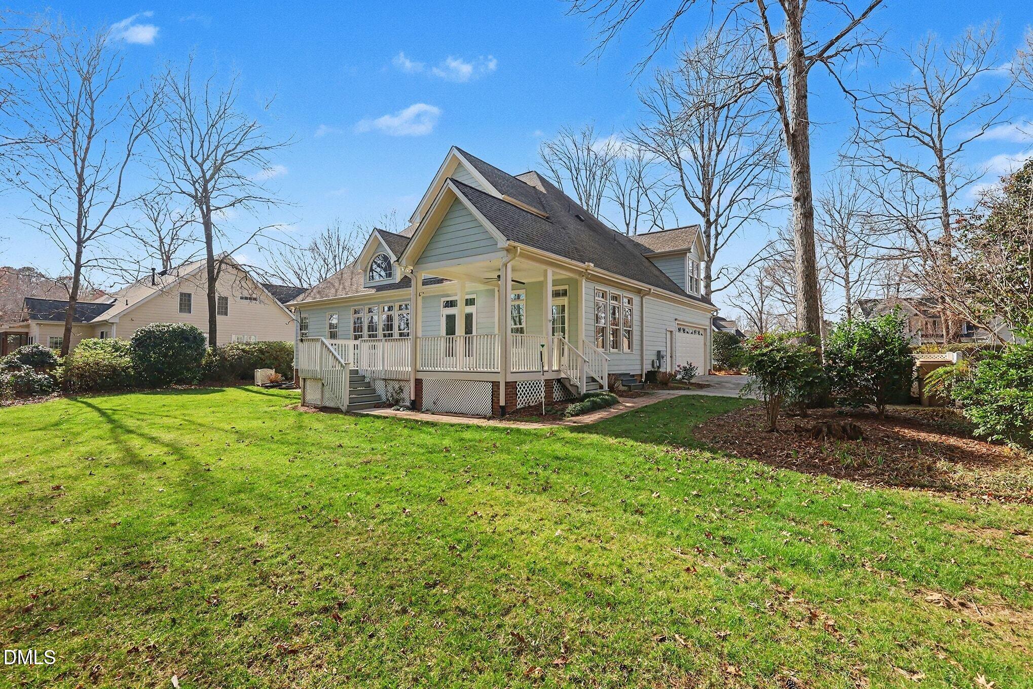 1108 Neuse Ridge Drive Clayton, NC 27527 - Photo 47 of 52 a view of a house with backyard and garden