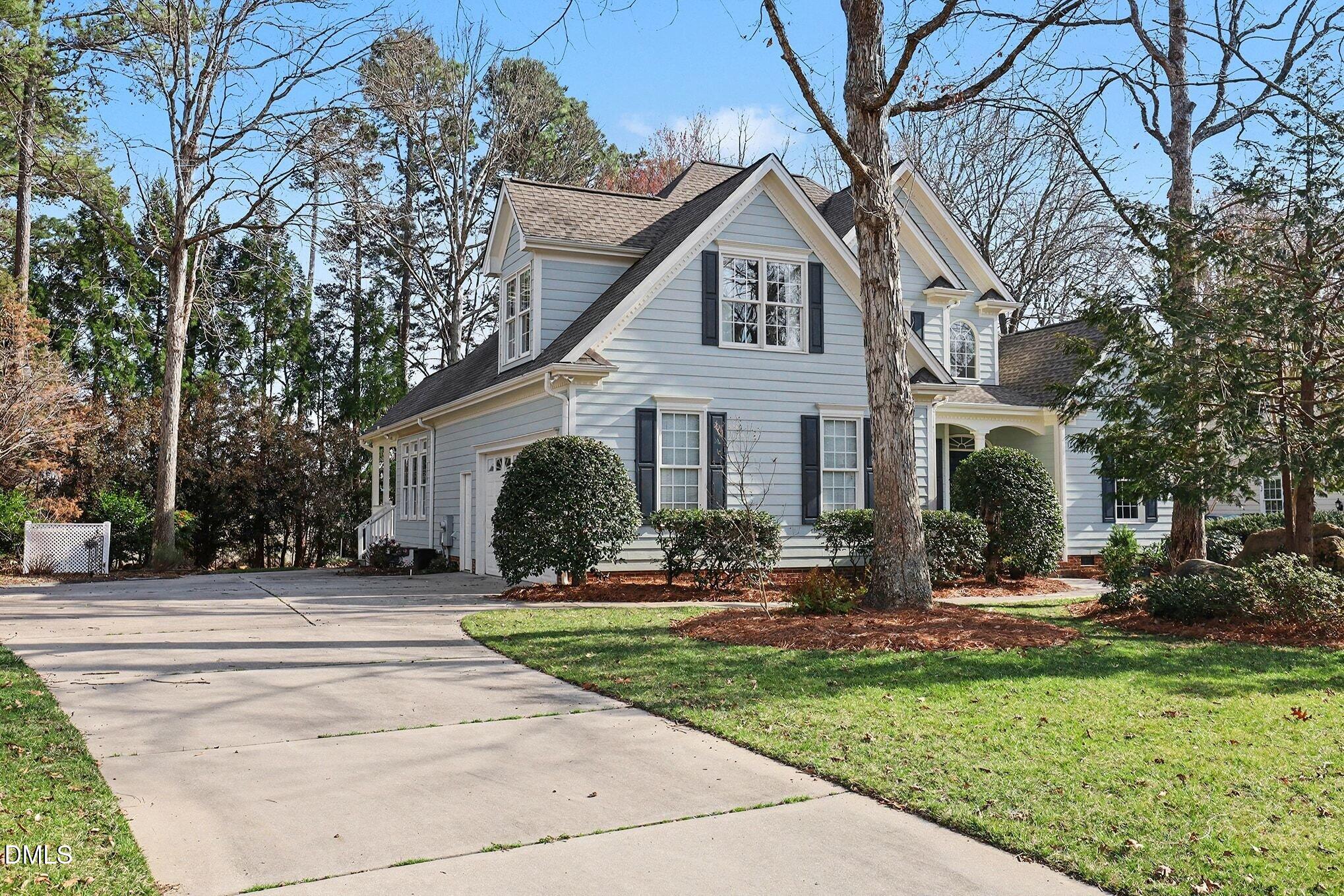 1108 Neuse Ridge Drive Clayton, NC 27527 - Photo 4 of 52 a front view of a house with a yard