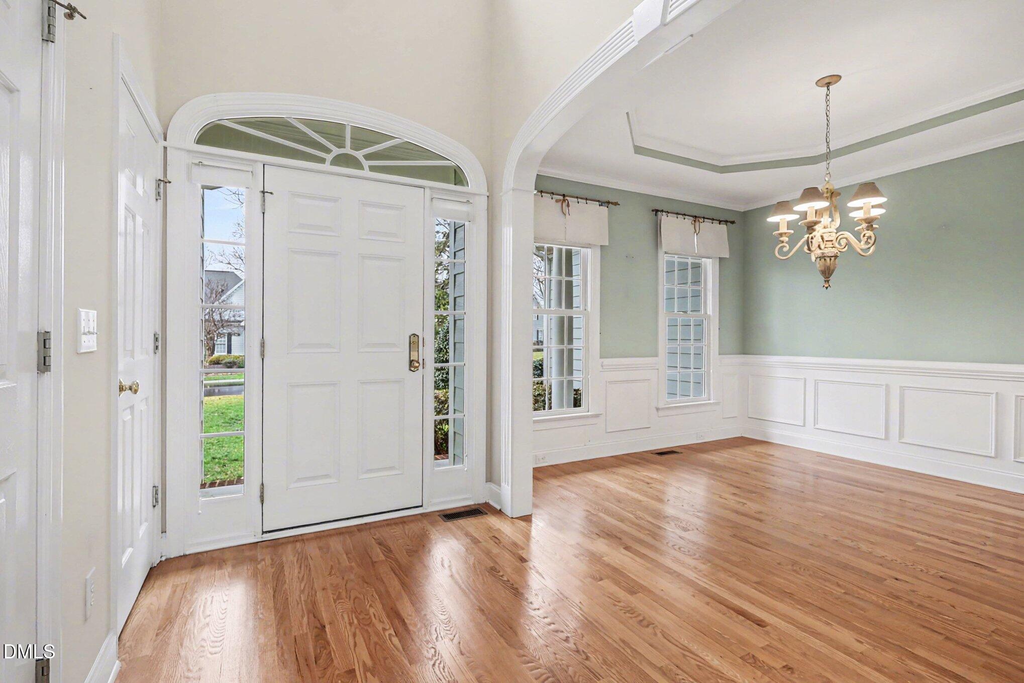 1108 Neuse Ridge Drive Clayton, NC 27527 - Photo 6 of 52 wooden floor in an empty room with a window