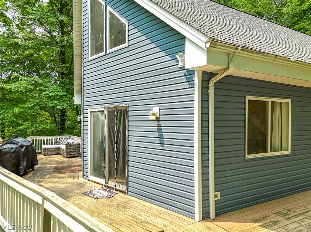 15980 Adams Road Middlefield, OH 44062 - Photo 4 of 49 View of side of home featuring a wooden deck