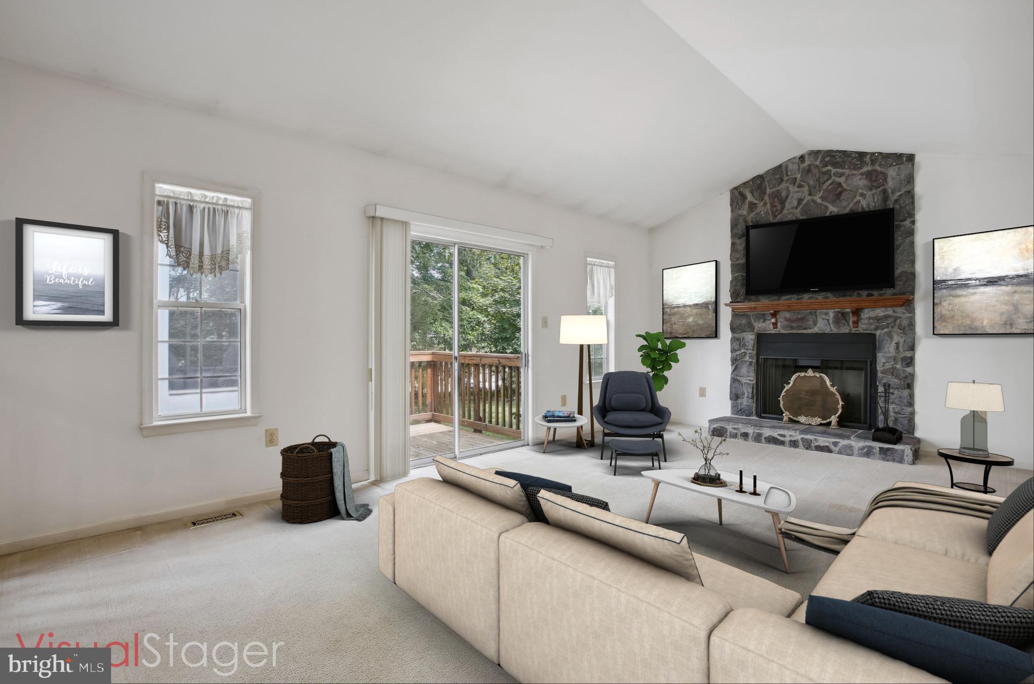 1529 Kingstream Circle Herndon, VA 20170 - Photo 4 of 74 Spacious family room with stone fireplace