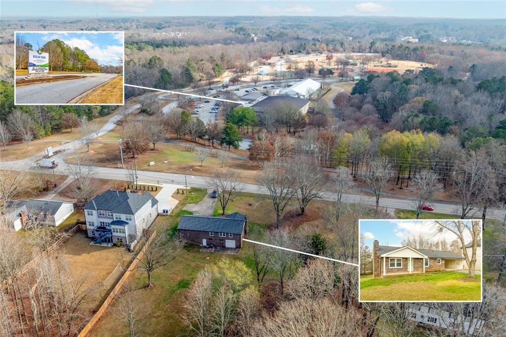 2720 North Bogan Road Northeast Buford, GA 30519 - Photo 2 of 29 an aerial view of a house with swimming pool and a yard