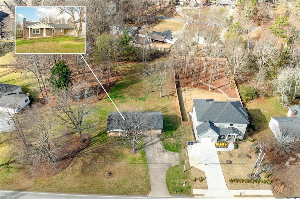 2720 North Bogan Road Northeast Buford, GA 30519 - Photo 3 of 29 a view of yard along with trees