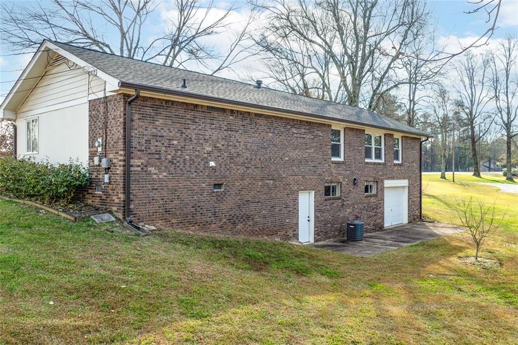 2720 North Bogan Road Northeast Buford, GA 30519 - Photo 5 of 29 a view of a backyard with a garden