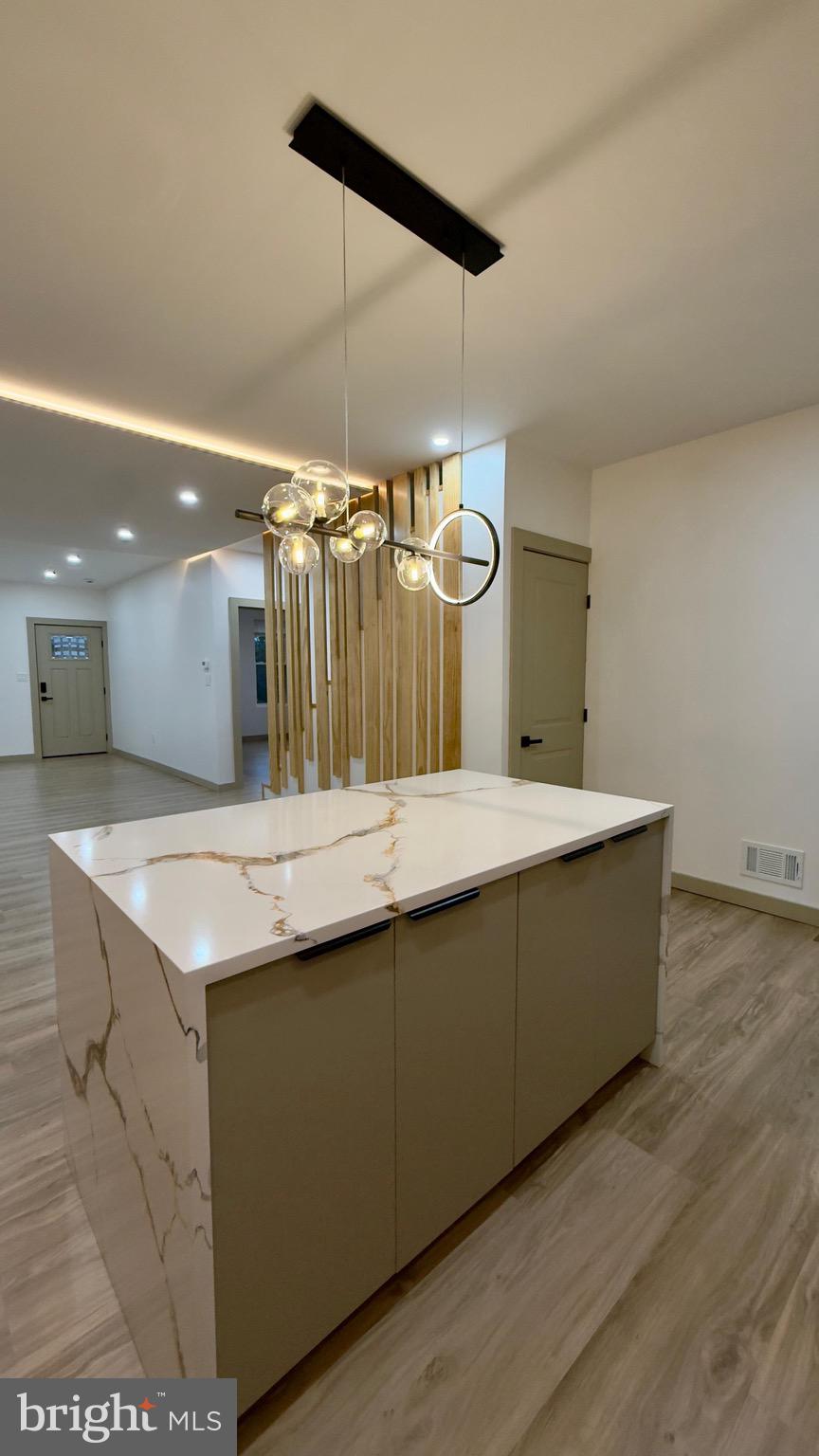 1011 Elnore Avenue Temple, PA 19560 - Photo 11 of 61 a bathroom with a sink and a mirror